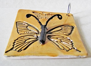 Butterfly stamp side view